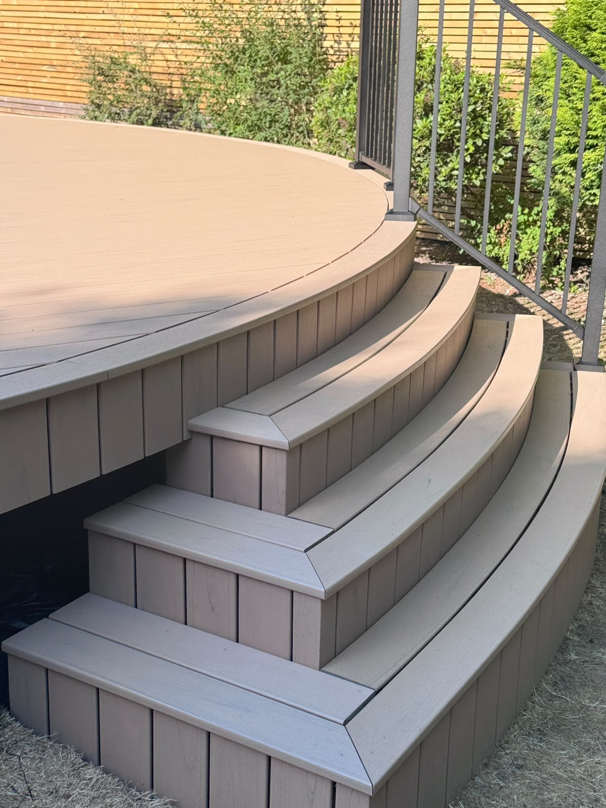 Detail of curved composite decking board trim