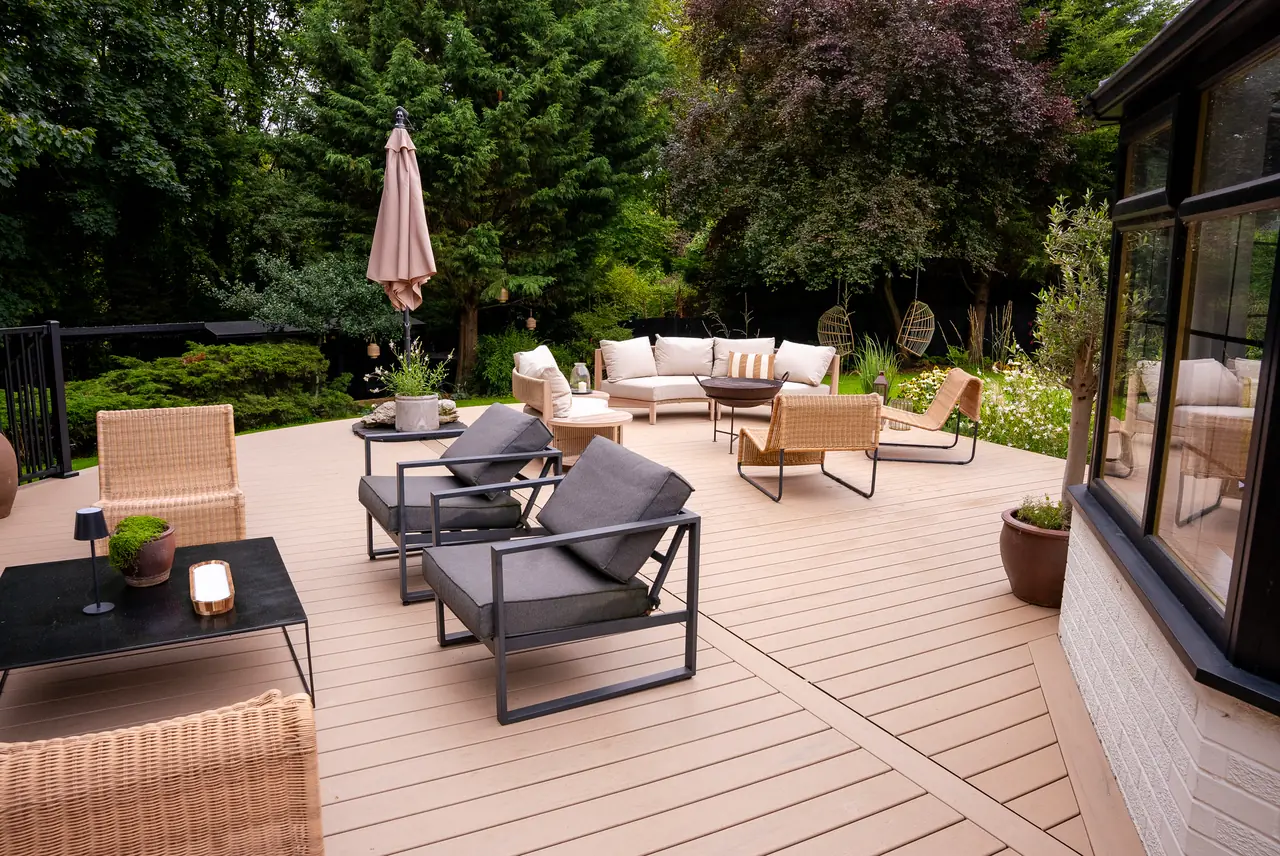Outdoor sofas and chairs on a wide Trex Transcend Lineage deck in Carmel