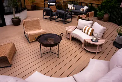 Seating round a fire bowl on a Trex Transcend Lineage deck in Carmel