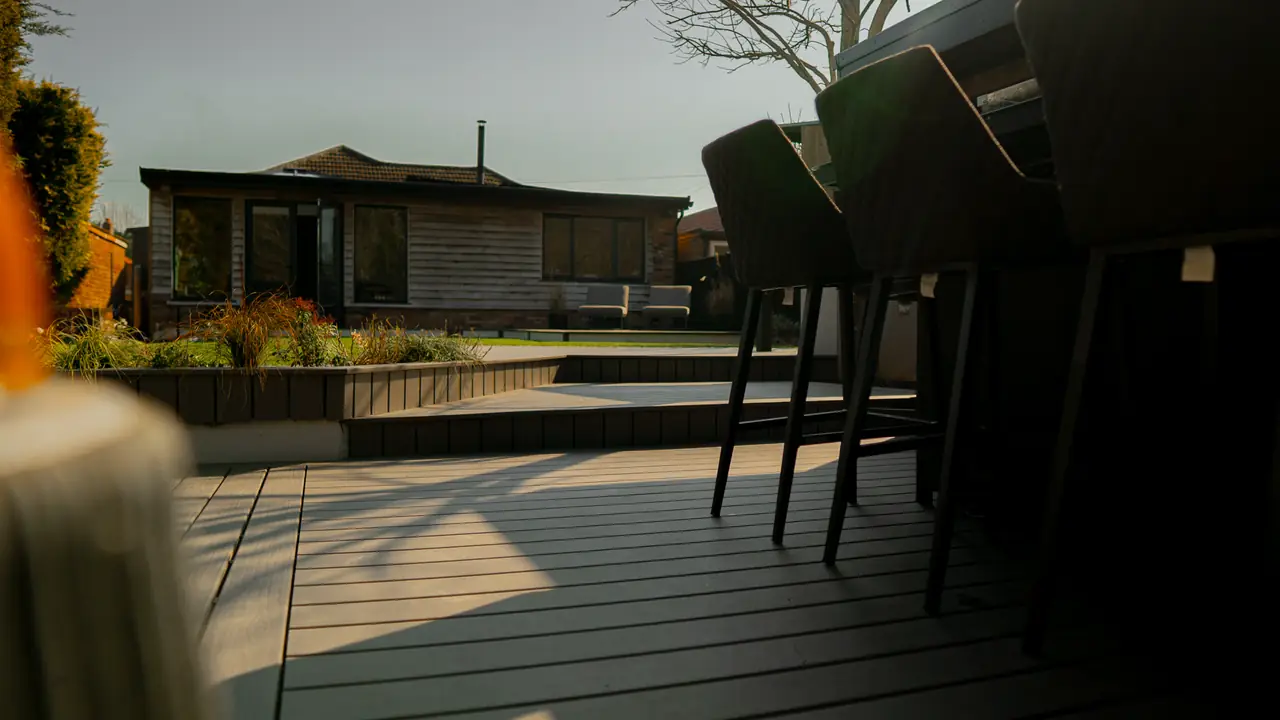 Multi-level composite decking with raised planters